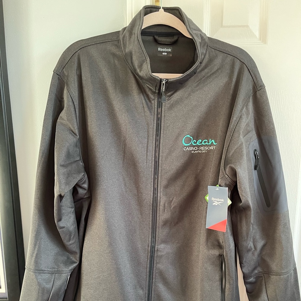 Ocean/Reebok men’s long sleeve fleece. Size is large, but looks closer to an xl.